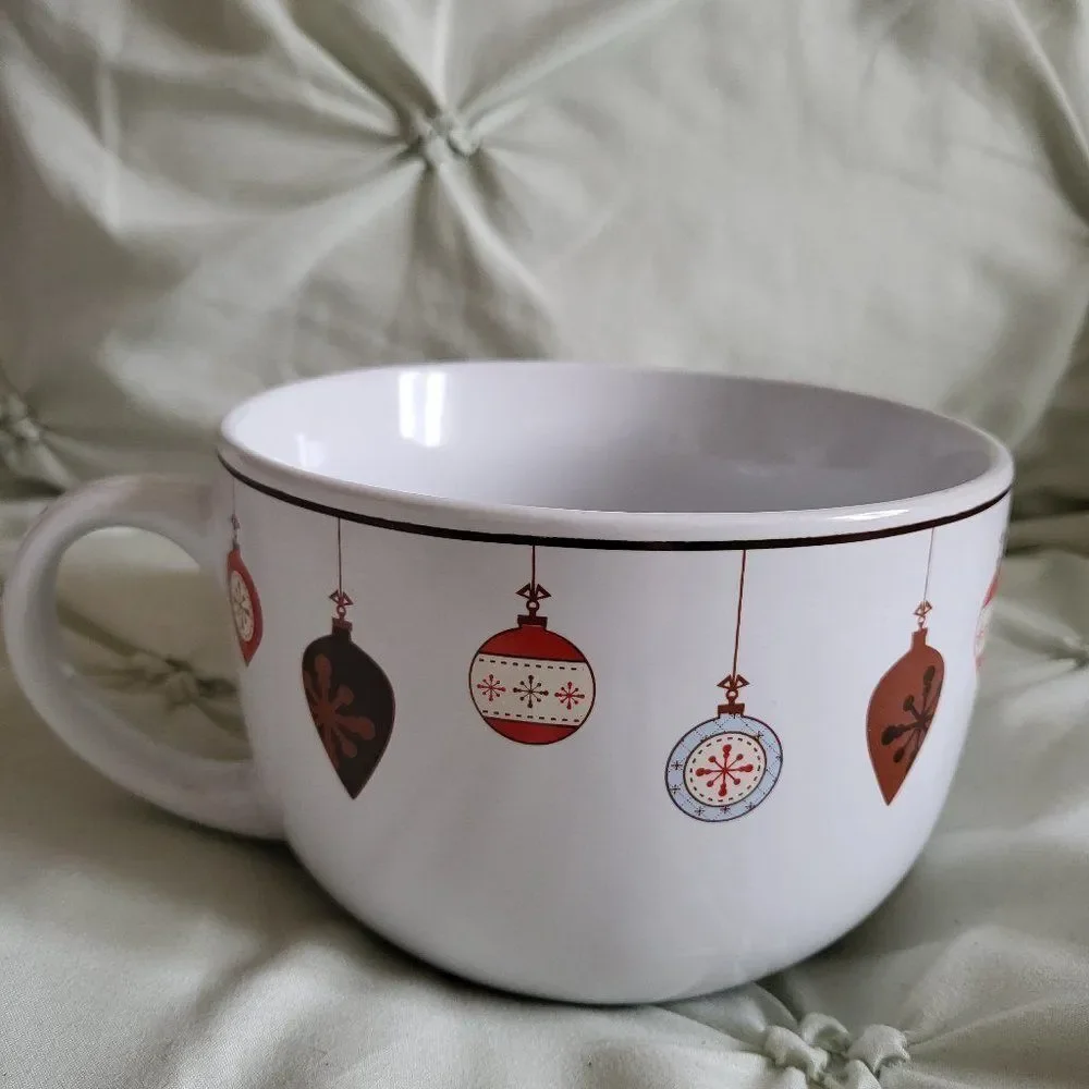 Oversized Holiday coffee mug by Design Pac with cute ornaments around the rim